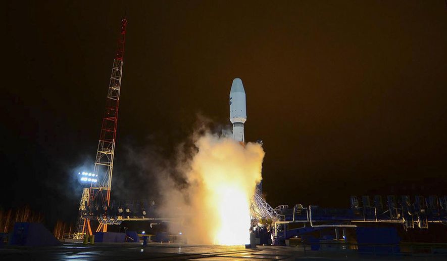 In this photo taken on Thursday, Oct. 25, 2018 and distributed by Roscosmos Space Agency Press Service, a Russian Soyuz-2 booster rocket takes off from the Plesetsk launch facility in northwestern Russia. A Russian Soyuz-2 rocket put a military satellite in orbit on Thursday Oct. 25, 2018, its first successful launch since a similar rocket failed earlier this month to deliver a crew to the International Space Station.(Roscosmos Space Agency Press Service via AP)