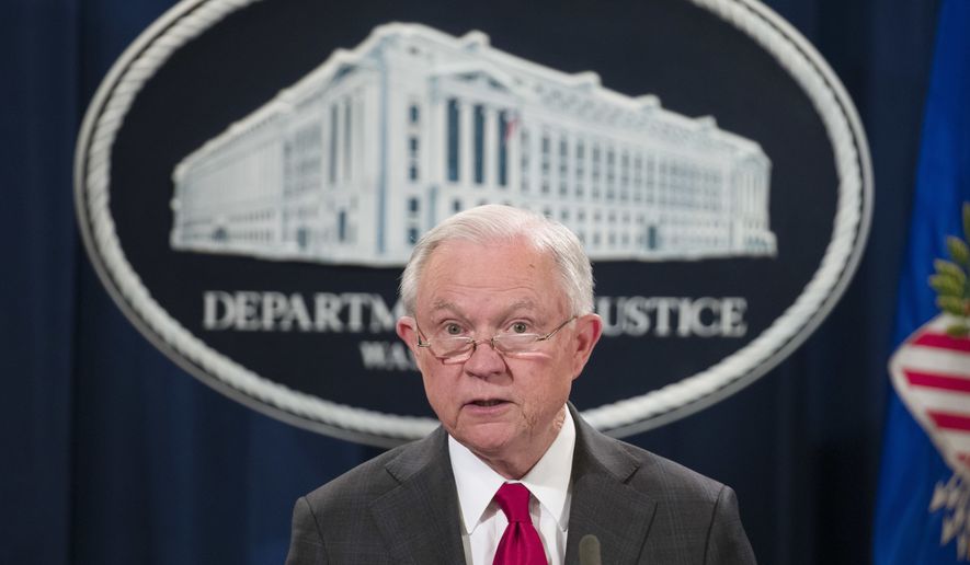 Attorney General Jeff Sessions pauses before speaking about the arrest of Cesar Sayoc, 56, of Aventura, Fla., in the package bomb case, during a news conference at the Department of Justice, Friday, Oct. 26, 2018, in Washington. (AP Photo/Alex Brandon)