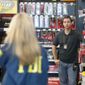 An FBI agent and a detective talk at an Auto Zone auto parts store, Friday, Oct. 26, 2018, in Plantation, Fla. Federal authorities took a man into custody Friday at the store in connection with the mail-bomb scare that earlier widened to 12 suspicious packages, the FBI and Justice Department said. (AP Photo/Wilfredo Lee)