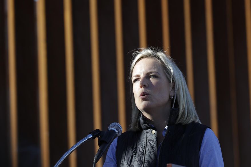 U.S. Department of Homeland Security Secretary Kirstjen Nielsen speaks in front of a newly fortified border wall structure Friday, Oct. 26, 2018, in Calexico, Calif. (AP Photo/Gregory Bull)