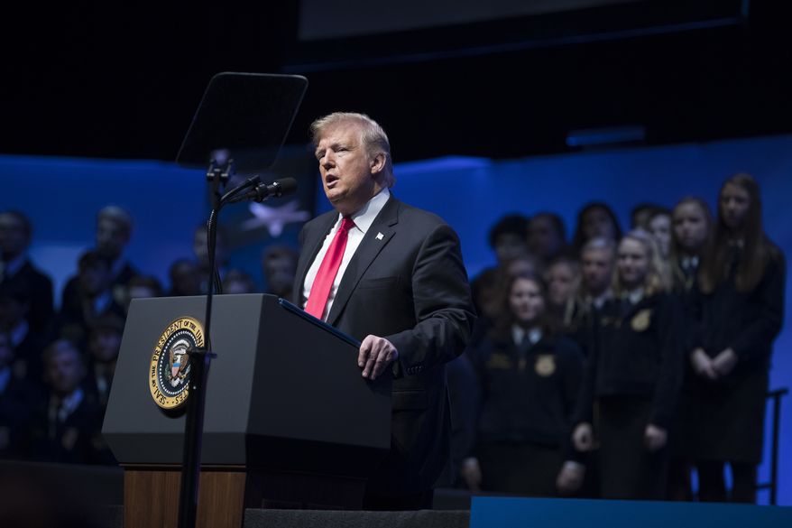 President Donald Trump speaks at the 91st Annual Future Farmers of America Convention and Expo at Bankers Life Fieldhouse in Indianapolis, Saturday, Oct. 27, 2018. (AP Photo/Andrew Harnik)