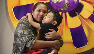 In this Sept. 26, 2018 photo, Julian Morales hugs his mom, Mayra Garcia, in their Homestead, Fla. home.  Julian was diagnosed with Dyskeratosis Congenita, a rare genetic disorder in which the marrow does not produce sufficient blood cells, when he was 3. While he&#x27;s on a medicine that has stabilized him, there are only a few more years it will work, doctors say.   (Emily Michot /Miami Herald via AP)