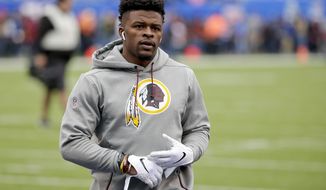 Washington Redskins running back Chris Thompson (25) warms up before an NFL football game against the New York Giants, Sunday, Oct. 28, 2018, in East Rutherford, N.J. (AP Photo/Seth Wenig) ** FILE **