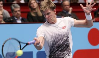 Kevin Anderson of South Africa returns returns the ball to Japan&#x27;s Kei Nishikori a during their final match at the Erste Bank Open tennis tournament in Vienna, Austria, Sunday, Oct. 28, 2018. (AP Photo/Ronald Zak)