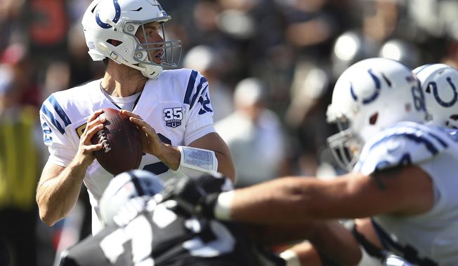 Indianapolis Colts quarterback Andrew Luck passes against the Oakland Raiders during the first half of an NFL football game in Oakland, Calif., Sunday, Oct. 28, 2018. (AP Photo/Ben Margot)
