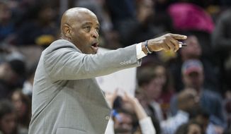 FILE - In this April 1, 2018 file photo, Cleveland Cavaliers interim coach Larry Drew gestures to his team during the second half of an NBA basketball game against the Dallas Mavericks in Cleveland. The Cavaliers have a coach for Tuesday night, Oct. 30. Top assistant Drew, who was expected to take over after Cleveland fired Tyronn Lue, said Monday, Oct. 29 that he is not the team’s interim coach but is merely “the voice right now.” Drew said his agent Andy Miller has been in talks with the Cavs about restructuring his contact and is not making any long-term commitment to the team until they reach an agreement. Lue was fired on Sunday, Oct. 28 by general manager Koby (AP Photo/Phil Long, File)