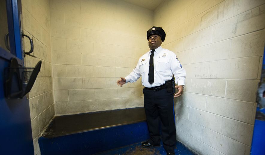 In this Friday, Oct. 26, 2018, file photo, Philadelphia Police Sgt. John Ross discusses the Police 9th District&#x27;s juvenile holding cell in Philadelphia.  (AP Photo/Matt Rourke) **FILE**