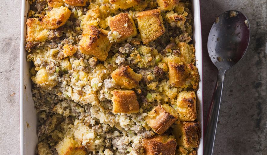 This undated photo provided by America's Test Kitchen in October 2018 shows homemade cornbread dressing in Brookline, Mass. This recipe appears in "The Complete Make-Ahead Cookbook." (Joe Keller/America's Test Kitchen via AP)
