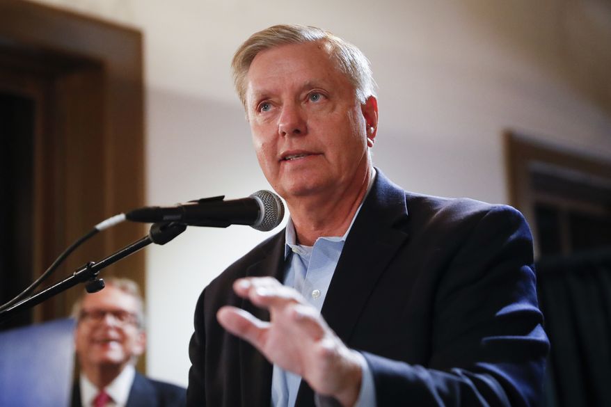 Sen. Lindsey Graham, R-S.C., speaks during a campaign event for Ohio Attorney General and Republican gubernatorial candidate Mike DeWine, left, Tuesday, Oct. 30, 2018, in downtown Cincinnati. (AP Photo/John Minchillo) ** FILE **
