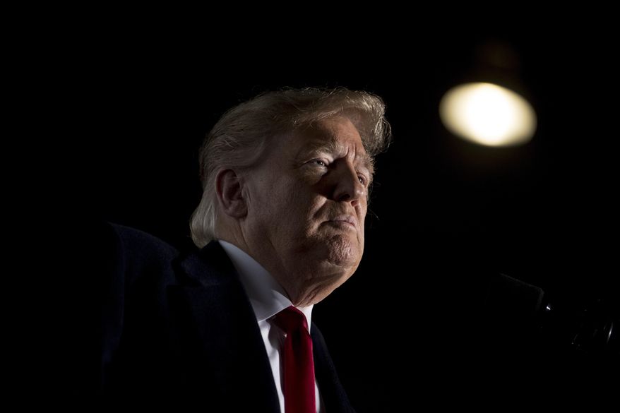 In this Oct. 27, 2018, file photo, then-President Donald Trump pauses while speaking at a rally at Southern Illinois Airport in Murphysboro, Ill. Former President Donald Trump vowed Tuesday to sign an executive order ending birthright citizenship if he makes it back to the White House. (AP Photo/Andrew Harnik, File)