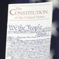 In this March 23, 2016, photo, the U.S. Constitution is held by a member of Congress on Capitol Hill in Washington. (AP Photo/J. Scott Applewhite) **FILE**
