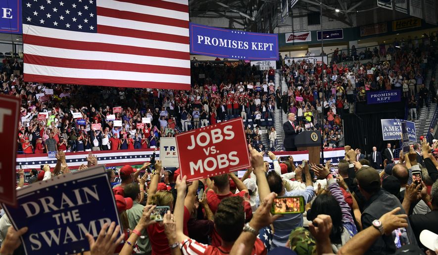 President Donald Trump speaks during a rally in Estero, Fla., Wednesday, Oct. 31, 2018. Trump is campaigning for Florida Republican Gov. Rick Scott, who is challenging incumbent Democratic Sen. Bill Nelson for a seat in the Senate. (AP Photo/Susan Walsh)