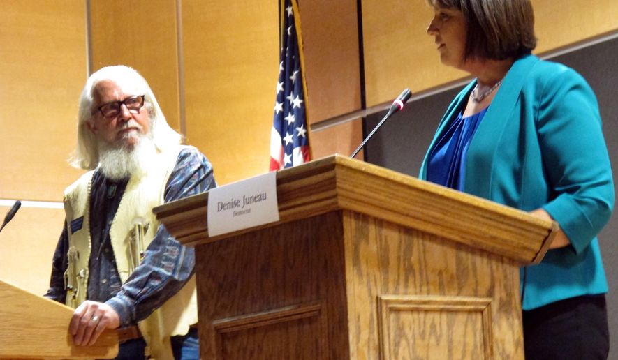 In this Oct. 5, 2016, photo, Libertarian Party candidate Rick Breckenridge, left, looks on during a debate with Democratic U.S. House candidate Denise Juneau in Great Falls, Montana. Breckenridge, who is running for U.S. Senate this year, endorsed Republican candidate Matt Rosendale in his race in response to an anonymous mailer that seeks to undermine conservative support of Rosendale. Rosendale is in a tight race against two-term Democratic Sen. Jon Tester. The mailer is reminiscent of tactics used by Democratic-friendly groups in Tester&#39;s 2012 race to promote the Libertarian candidate and peel away Republican voters. (AP Photo/Matt Volz)
