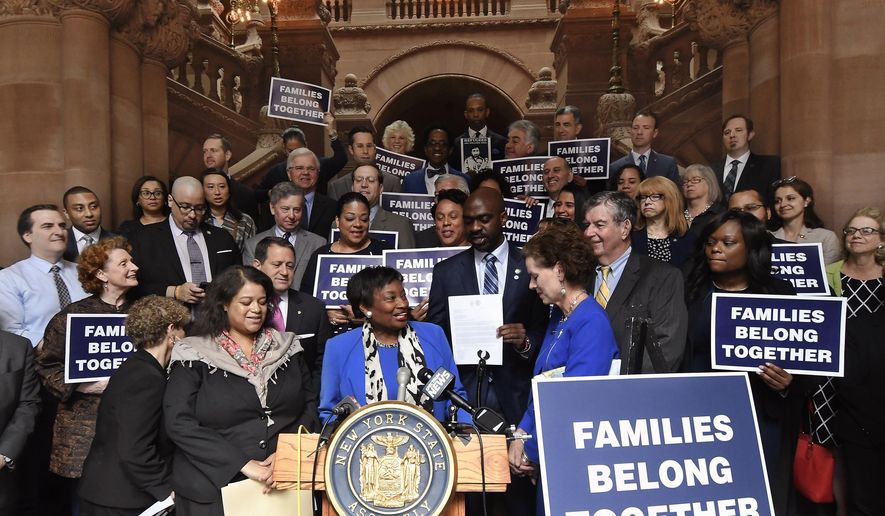 FILE - In this June 20, 2018 file photo, Senate Democratic Conference Leader Andrea Stewart-Cousins, D-Yonkers, stands behind the podium flanked by members of the New York Assembly Democratic Conference calling for an immediate end to the Trump White House policy of family separation for migrants crossing the US-Mexico border, during a rally at the state Capitol on the last scheduled day of the 2018 legislative session, in Albany, N.Y. New York Democrats are hoping a 'blue wave' during the upcoming election will help them take control of the state Senate, the last GOP bastion in Albany. (AP Photo/Hans Pennink, FIle)