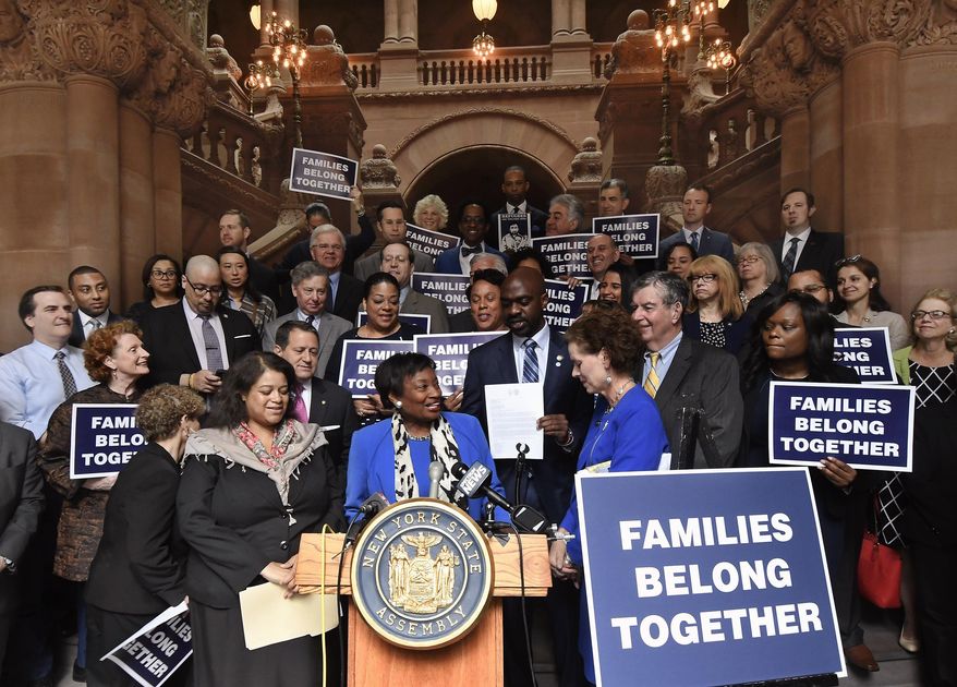 FILE - In this June 20, 2018 file photo, Senate Democratic Conference Leader Andrea Stewart-Cousins, D-Yonkers, stands behind the podium flanked by members of the New York Assembly Democratic Conference calling for an immediate end to the Trump White House policy of family separation for migrants crossing the US-Mexico border, during a rally at the state Capitol on the last scheduled day of the 2018 legislative session, in Albany, N.Y. New York Democrats are hoping a 'blue wave' during the upcoming election will help them take control of the state Senate, the last GOP bastion in Albany. (AP Photo/Hans Pennink, FIle)