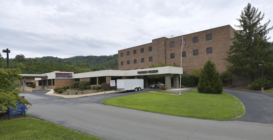 This Aug. 25, 2018, photo shows the Lee County Medical Center in Pennington Gap, Va. Virginia's westernmost county had appeared to be on track to reopen its only hospital, a rare accomplishment a rural community anywhere in the country. But questions involving the company expected to run the Lee County facility have thrown the plan into question at the last minute. (AP Photo/Earl Neikirk)