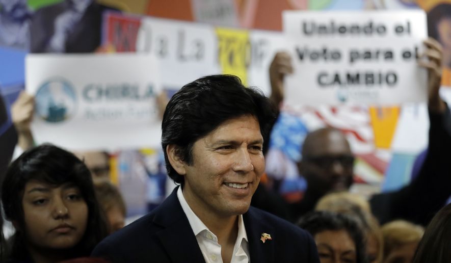 State Sen. Kevin de Leon, D-Los Angeles, smiles during a campaign stop at CHIRLA Action Fund headquarters Tuesday, Sept. 25, 2018, in Los Angeles. De Leon is running for U.S. Senate against incumbent Dianne Feinstein. (AP Photo/Marcio Jose Sanchez)