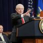 Attorney General Jeff Sessions gestures while speaking at the U.S. Marshals Service 37th Director&#39;s Honorary Awards Ceremony, at the Department of Justice in Washington, Thursday, Nov. 1, 2018. Sitting behind Sessions is Deputy Attorney General Rod Rosenstein. (AP Photo/Pablo Martinez Monsivais)