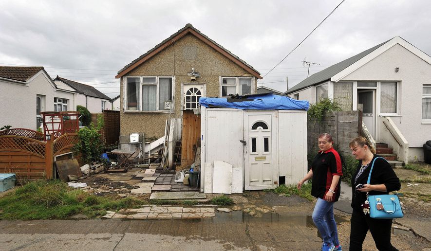 FILE - This Aug. 20, 2015 file photo shows a street in Jaywick, east England. The political battle raging in the United States as midterm elections approach has had an unexpected impact in a small coastal village in southern England. (Nick Ansell/PA via AP)