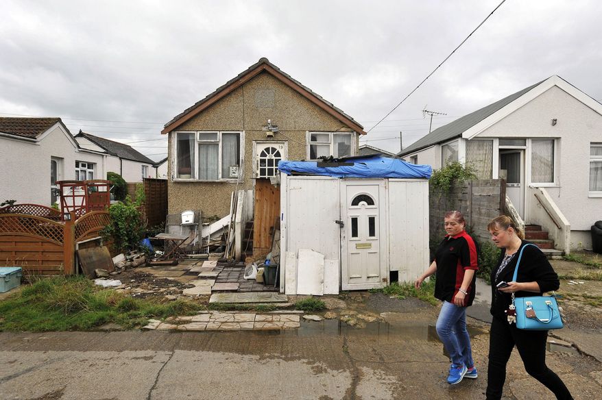 FILE - This Aug. 20, 2015 file photo shows a street in Jaywick, east England. The political battle raging in the United States as midterm elections approach has had an unexpected impact in a small coastal village in southern England. (Nick Ansell/PA via AP)