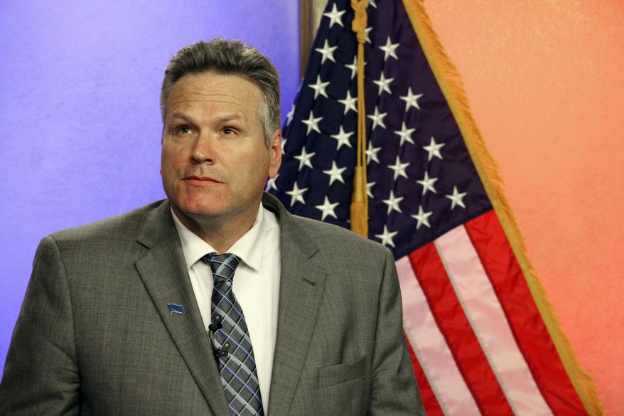 FILE - This Oct. 25, 2018, file photo shows Republican gubernatorial candidate Mike Dunleavy prior to a debate with his Democratic opponent, Mark Begich, in Anchorage, Alaska. The two major candidates for governor in Alaska are facing off one more time before next week's general election. Begich and Dunleavy are expected to participate in a broadcast debate sponsored by Anchorage TV station KTVA Thursday evening, Nov. 1, 2018. Both are vying to succeed Gov. Bill Walker. (AP Photo/Mark Thiessen, File)