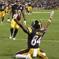 FILE- In this Sept. 30, 2018, file photo, Pittsburgh Steelers wide receiver Antonio Brown (84) celebrates his touchdown catch from quarterback Ben Roethlisberger during the first half of an NFL football game against the Baltimore Ravens in Pittsburgh. For the first time since 2014, these AFC North rivals will wrap up the season series before December. That doesn’t mean Sunday’s game against the Steelers is any less important to the skidding Ravens. (AP Photo/Fred Vuich, File)