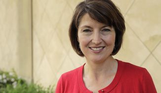 In this Aug. 22, 2018 photo, U.S. Rep. Cathy McMorris Rodgers, R-Wash., poses for a photo in Spokane, Wash. McMorris Rodgers, who is fourth in House leadership and the highest ranking woman in the GOP, is facing a formidable challenge in the 5th Congressional District from Democrat Lisa Brown. (AP Photo/Ted S. Warren)
