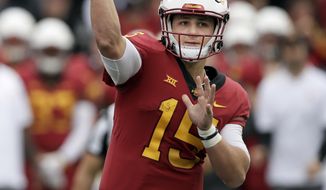 Iowa State quarterback Brock Purdy (15) passes to a teammate during the second half of an NCAA college football game against Kansas in Lawrence, Kan., Saturday, Nov. 3, 2018. (AP Photo/Orlin Wagner)
