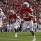 Wisconsin&#39;s Jonathan Taylor runs for a touchdown during the second half of an NCAA college football game against Rutgers Saturday, Nov. 3, 2018, in Madison, Wis. (AP Photo/Morry Gash)