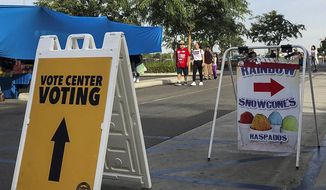 An Orange County registrar pop-up voting location is seen at the Golden West College in Huntington Beach, Calif., Sunday, Nov. 4, 2018. (AP Photo/Amy Taxin)