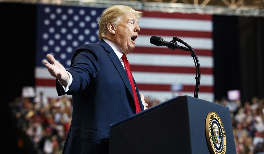 President Donald Trump speaks during a rally at the IX Center, in Cleveland, Monday, Nov. 5, 2018. (AP Photo/Carolyn Kaster)