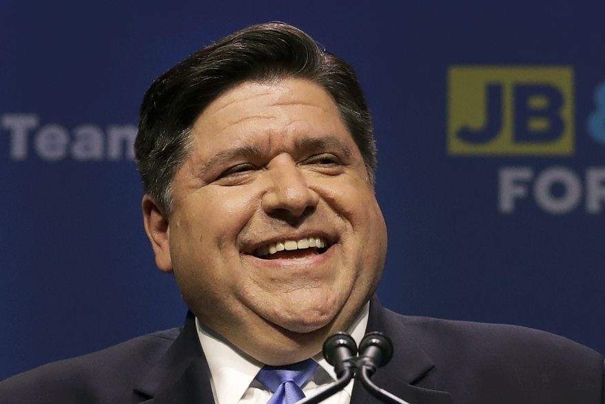In this March 20, 2018 file photo, Democratic gubernatorial candidate J.B. Pritzker smiles at his primary election night party in Chicago. Pritzker faces incumbent GOP Gov. Bruce Rauner in the Nov. 6 election. (AP Photo/Charles Rex Arbogast) **FILE**