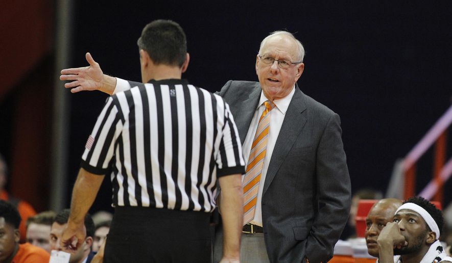 Syracuse coach Jim Boeheim, right, talks with official Pat Driscoll during the second half of the team&#39;s college basketball exhibition game against Le Moyne in Syracuse, N.Y., Wednesday, Oct. 31, 2018. (AP Photo/Nick Lisi)