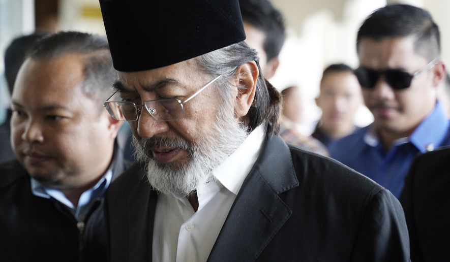 Former chief minister of Saba state on Borneo island, Musa Aman arrives at Kuala Lumpur High Court in Kuala Lumpur, Malaysia, Monday, Nov. 5, 2018. Malaysia&#39;s anti-graft agency said Monday that the former leader of a timber-rich eastern state has been arrested and will face corruption charges amid a widening crackdown on abuse by officials. (AP Photo/Yam G-Jun)