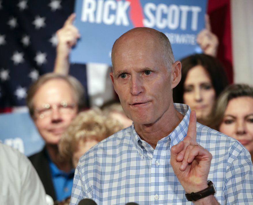 Republican Gov. Rick Scott opposed the measure, arguing that felons should have to complete a process before having their rights reestablished. (Associated Press)