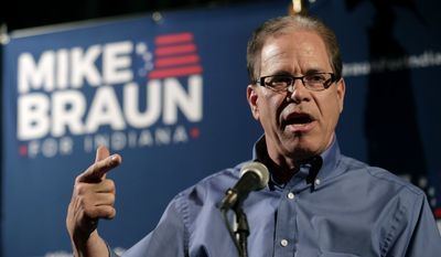 This May 8, 2018, file photo, shows then-Republican Senate candidate Mike Braun as he thanks supporters after winning the Republican primary in Whitestown, Ind. (AP Photo/Michael Conroy, File)