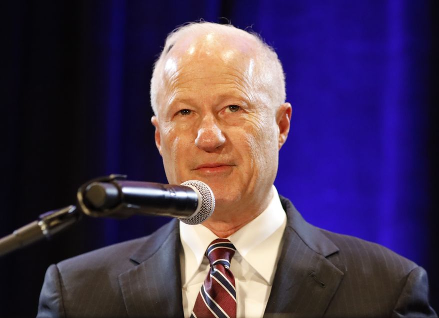 United States Rep. Mike Coffman, R-Colo., 6th District, delivers his concession speech during an election night party in Lone Tree, Colo., Tuesday, Nov. 6, 2018. (AP Photo/Jack Dempsey)