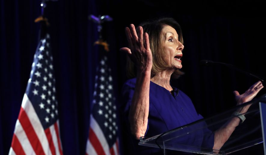 House Democratic Leader Nancy Pelosi of Calif., speaks to a crowd of volunteers and supporters of the Democratic party at an election night returns event at the Hyatt Regency Hotel, on Tuesday, Nov. 6, 2018, in Washington. (AP Photo/Jacquelyn Martin)