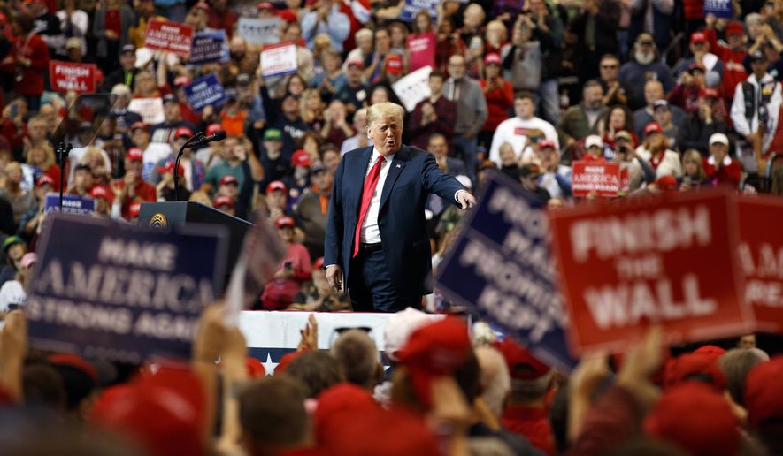 President Donald Trump arrives to speak at a campaign rally at the IX Center, in Cleveland, Monday, Nov. 5, 2018, (AP Photo/Carolyn Kaster)