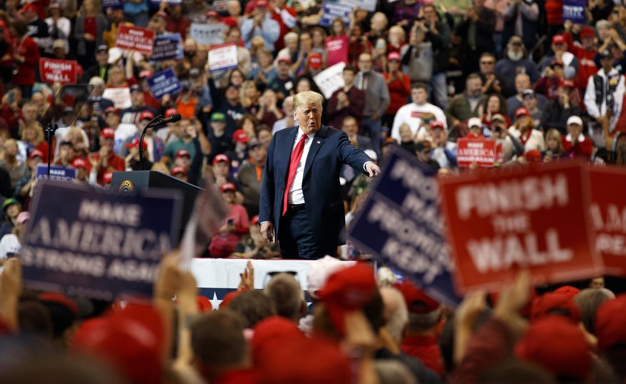 President Donald Trump arrives to speak at a campaign rally at the IX Center, in Cleveland, Monday, Nov. 5, 2018, (AP Photo/Carolyn Kaster)