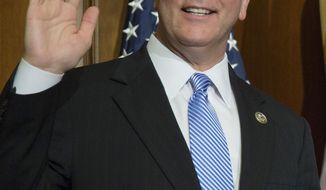 FILE-In this Jan. 1, 2017 file photo, Rep. Mike Rogers, R-Ala., poses for a photo during a mock swearing in ceremony on Capitol Hill in Washington.   Rogers is facing a challenge from Democrat Mallory Hagan, a former Miss. America, Tuesday, Nov. 6, 2018 in the state&#39;s most closely watched congressional race. (AP Photo/Zach Gibson, File)