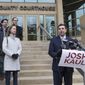 Democratic candidate for state attorney general Josh Kaul, right, claims victory during a news conference Wednesday, Nov. 7, 2018 at the Dane County Courthouse in Madison, Wis. (Mark Hoffman/Milwaukee Journal-Sentinel via AP)