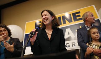 Elaine Luria speaks to a room full of supporters after upsetting incumbent Scott Taylor to win Virginia&#39;s 2nd Congressional District on Tuesday, Nov. 6, 2018, night in Virginia Beach. (Stephen M. Katz/The Virginian-Pilot via AP)