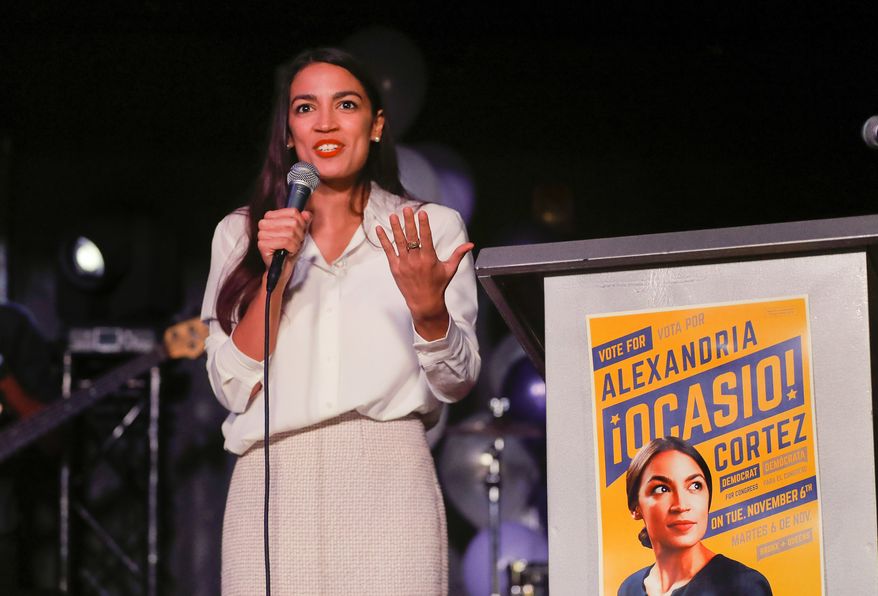 New York Democratic Congressional candidate Alexandria Ocasio-Cortez speaks to supporters, Tuesday, Nov. 6, 2018 in Queens the Queens borough of New York, after defeating Republican challenger Anthony Pappas in the race for the 14th Congressional district of New York. (AP Photo/Stephen Groves)