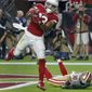 FILE- In this Sunday, Oct. 28, 2018, file photo, Arizona Cardinals wide receiver Christian Kirk (13) makes a touchdown catch as San Francisco 49ers defensive back Tyvis Powell (30) defends during the second half of an NFL football game in Glendale, Ariz. Too small, not fast enough. Kirk knows about all the pre-draft criticism of him, he says he wrote it all down and reads it every day. (AP Photo/Rick Scuteri, File)