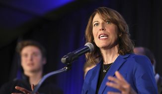In this file photo, Iowa Democratic Congressional candidate Cindy Axne delivers her acceptance speech for Iowa&#39;s 3rd Congressional District at the Iowa Democratic election night party, Wednesday, Nov. 7, 2018, in Des Moines, Iowa. Now in her second term in Congress, Ms. Axne is a target of the conservative group Americans for Prosperity, which is hoping to persuade House Democrats in vulnerable districts to vote no on key items of President Biden&#39;s economic agenda.  (AP Photo/Matthew Putney)  **FILE**