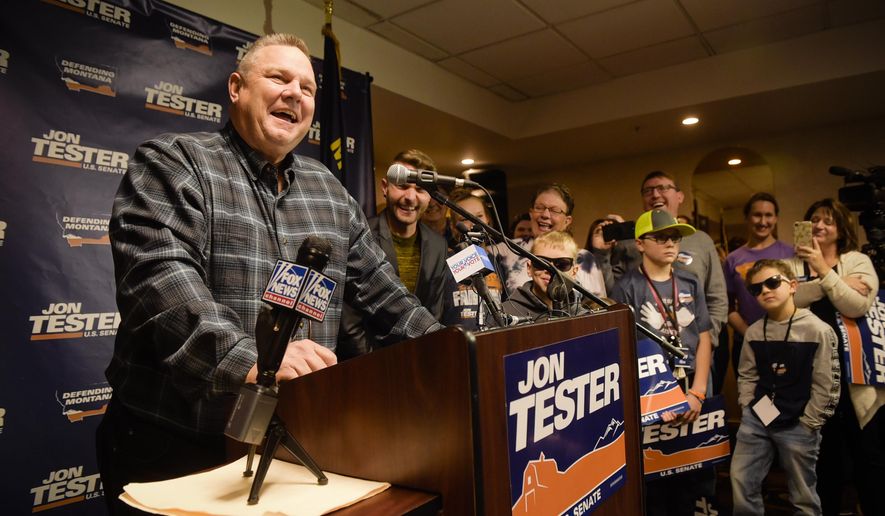 Sen. Jon Tester surrounded by family and supporters, announces his victory Wednesday, Nov. 7, 2018 in Great Falls, Mont.  Tester has won a third term in the U.S. Senate by beating Republican Matt Rosendale.Tester won Tuesday&#39;s close election despite President Donald Trump taking a personal interest in defeating him.  (Thom Bridge /Independent Record via AP)