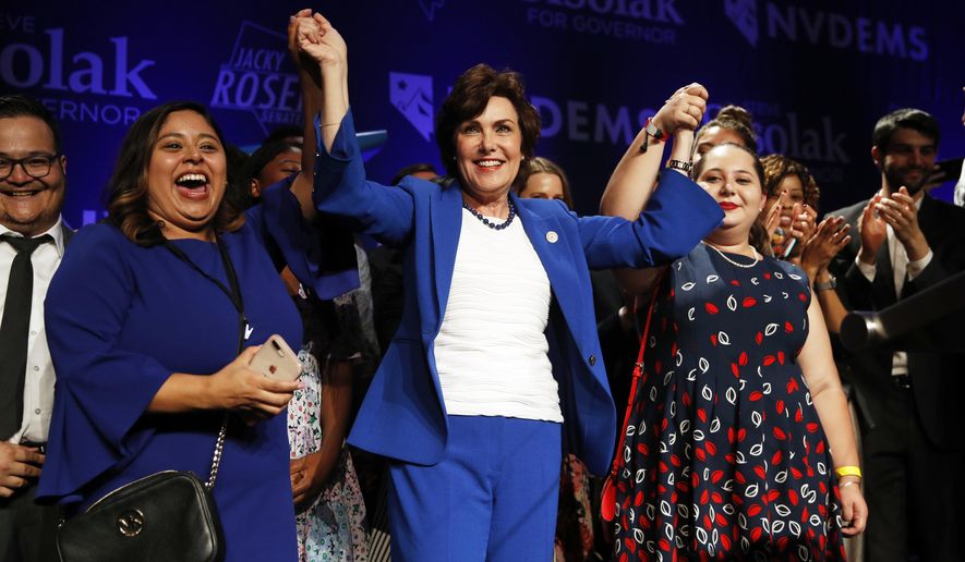 Rep. Jacky Rosen, D-Nev., center, celebrates at a Democratic election night party after winning a Senate seat Wednesday, Nov. 7, 2018, in Las Vegas. A female political movement driven by backlash to President Donald Trump kicked off 2018 by hosting a women's march in Nevada and 11 months later, that activism helped women win key races across the state, including ousting an incumbent U.S. Senator, electing a female-majority federal delegation and a female-majority state Assembly. (AP Photo/John Locher)