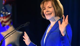 Sen. Tina Smith, D-Minn., speaks after winning a special election race to fill the vacated seat of former Sen. Al Franken during a election night event Tuesday, Nov. 6, 2018, in St. Paul, Minn. (AP Photo/Hannah Foslien)