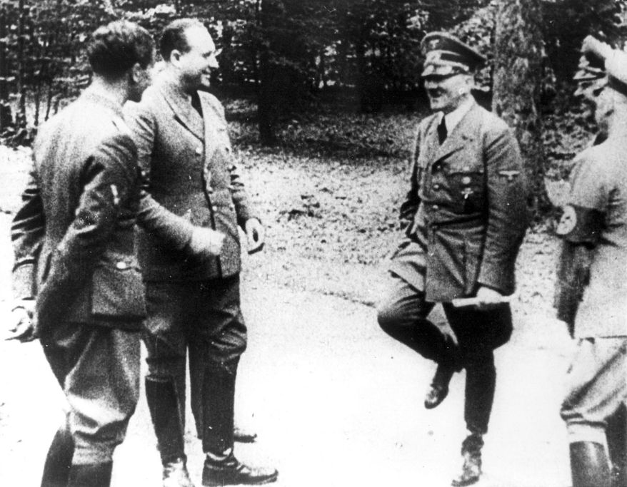 Adolf Hitler, right, at Compiegne in 1940 after dictating terms to France for their surrender, in Compiegne, north of Paris. (AP Photo) ** FILE **